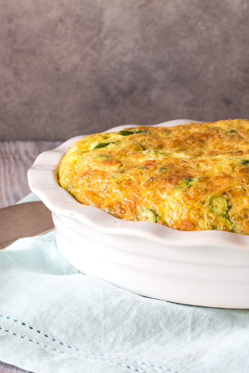 Side view of asparagus quiche fresh from the oven.