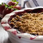 Farmhouse style crumble loaded with strawberries and blueberries, with just a hint of hibiscus tea. Topped with an oats crumble.