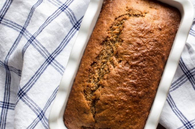 Healthy banana bread made with einkorn flour coconut oil, and sweetened with maple syrup and apple sauce, for a fresh-tasting bread from the Islands.