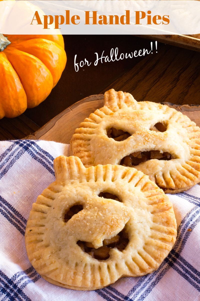 Pumpkin shaped hand pies filled with apples, ginger, cinnamon and cardamom. Perfect Halloween treat for both kids and adults! 