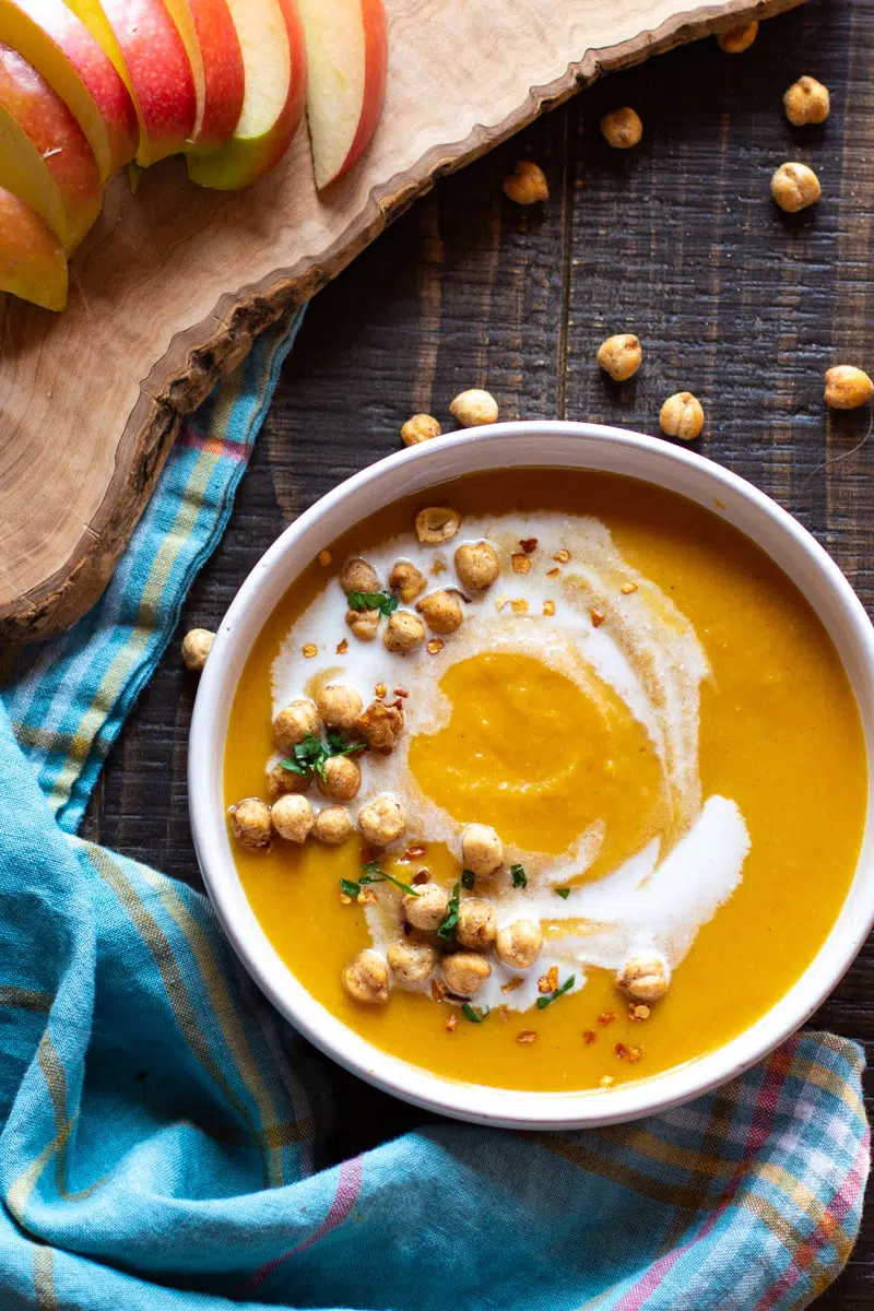 Vegan, roasted coconut curried butternut squash soup with apples.
