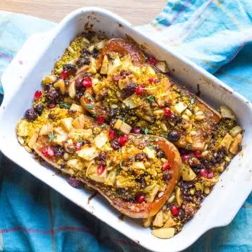 Roasted butternut squash with quinoa, apple and fig stuffing.