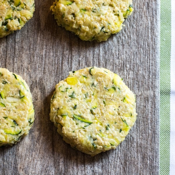 Molded zucchini fritters before they're cooked.