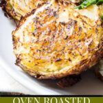 Slightly charred and crispy cabbage steaks on a plate with text overlay.